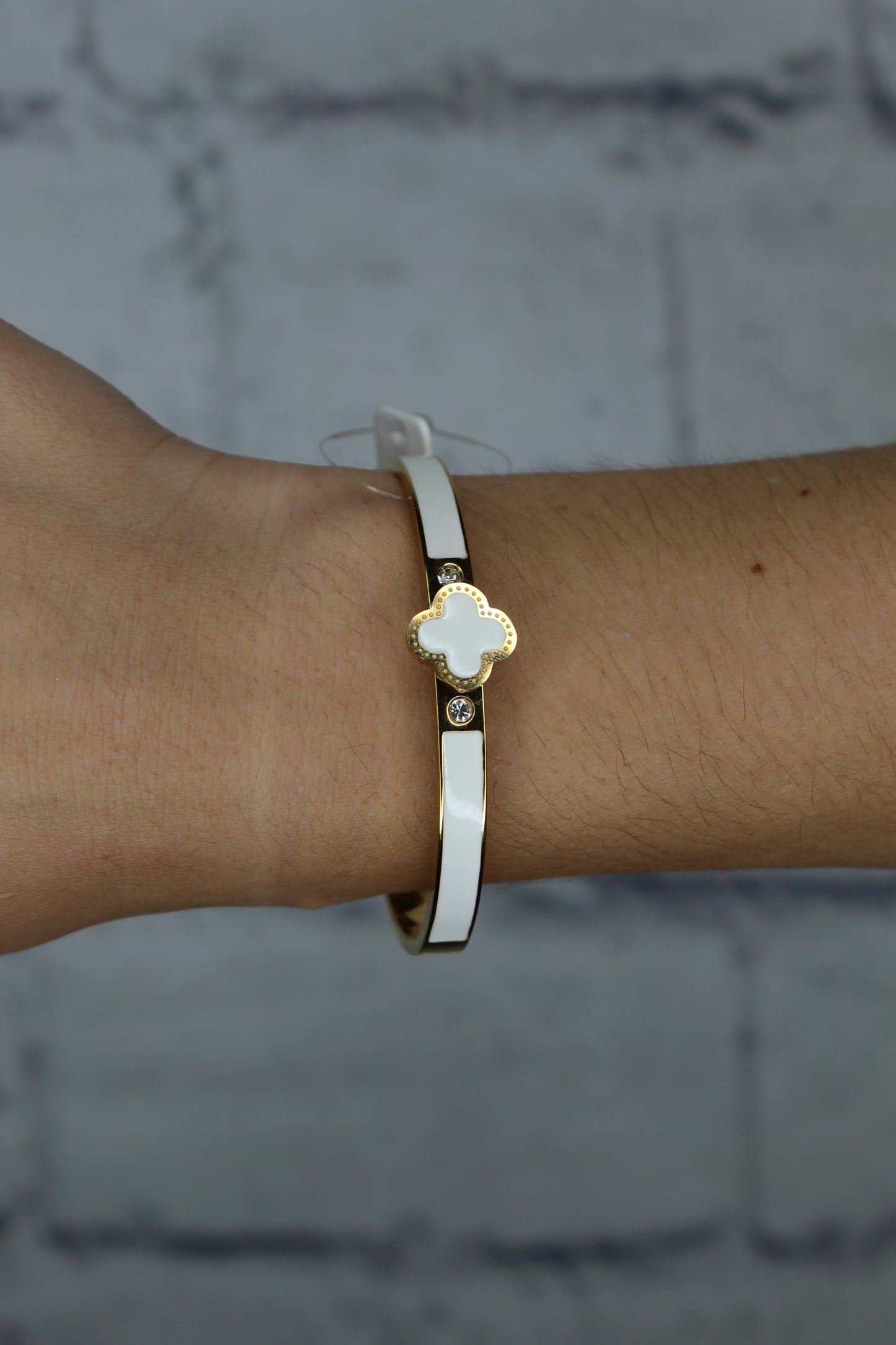 What’s hot - white and gold clover bracelet